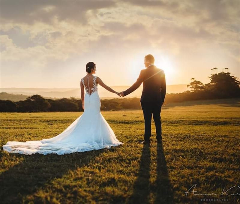 A newly married couple photographed in the reserve gardens.